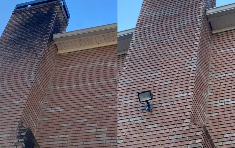 Pressure washing a driveway on a paid residential job